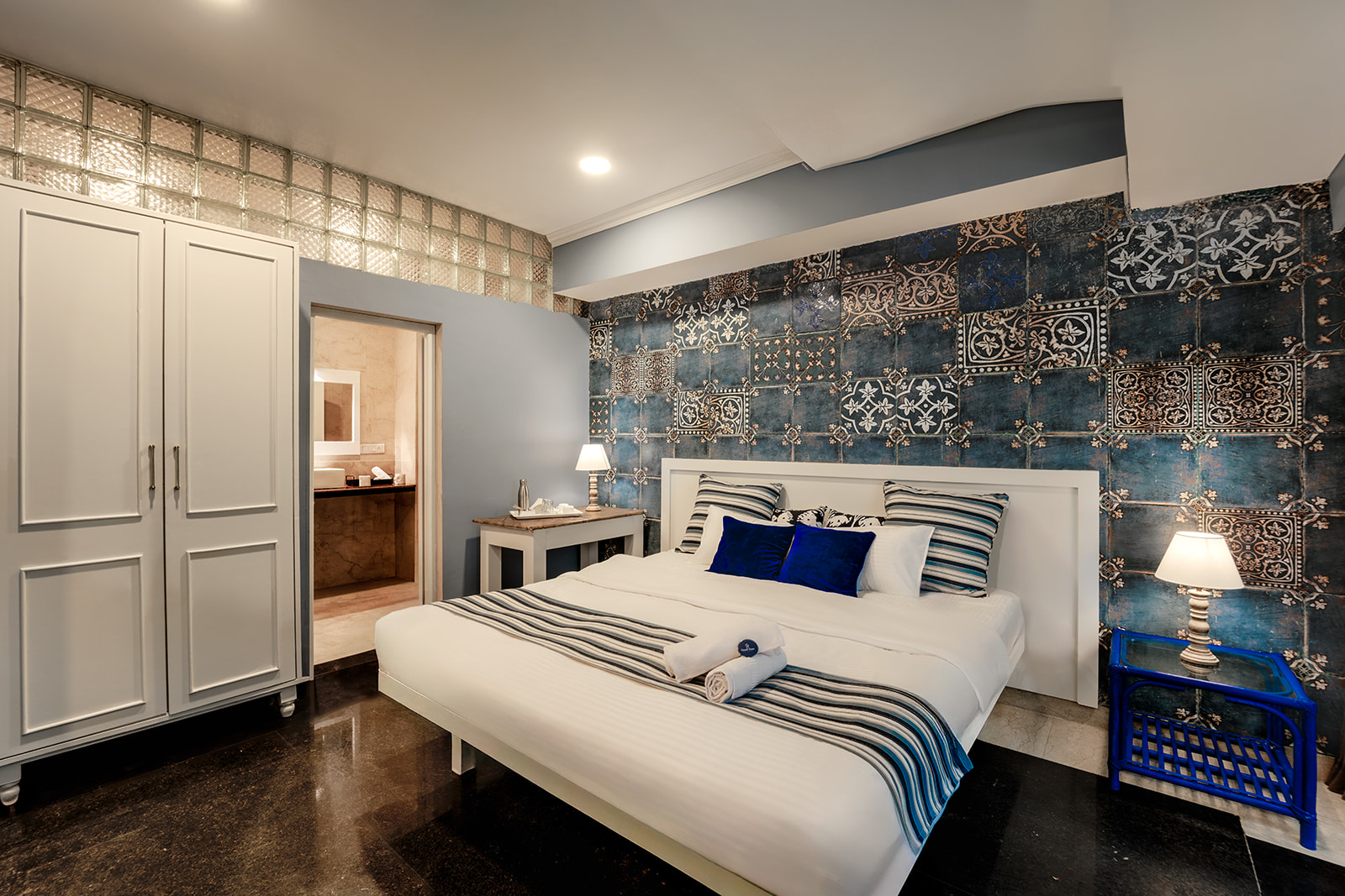 Family Room bedroom with a patterned blue wall