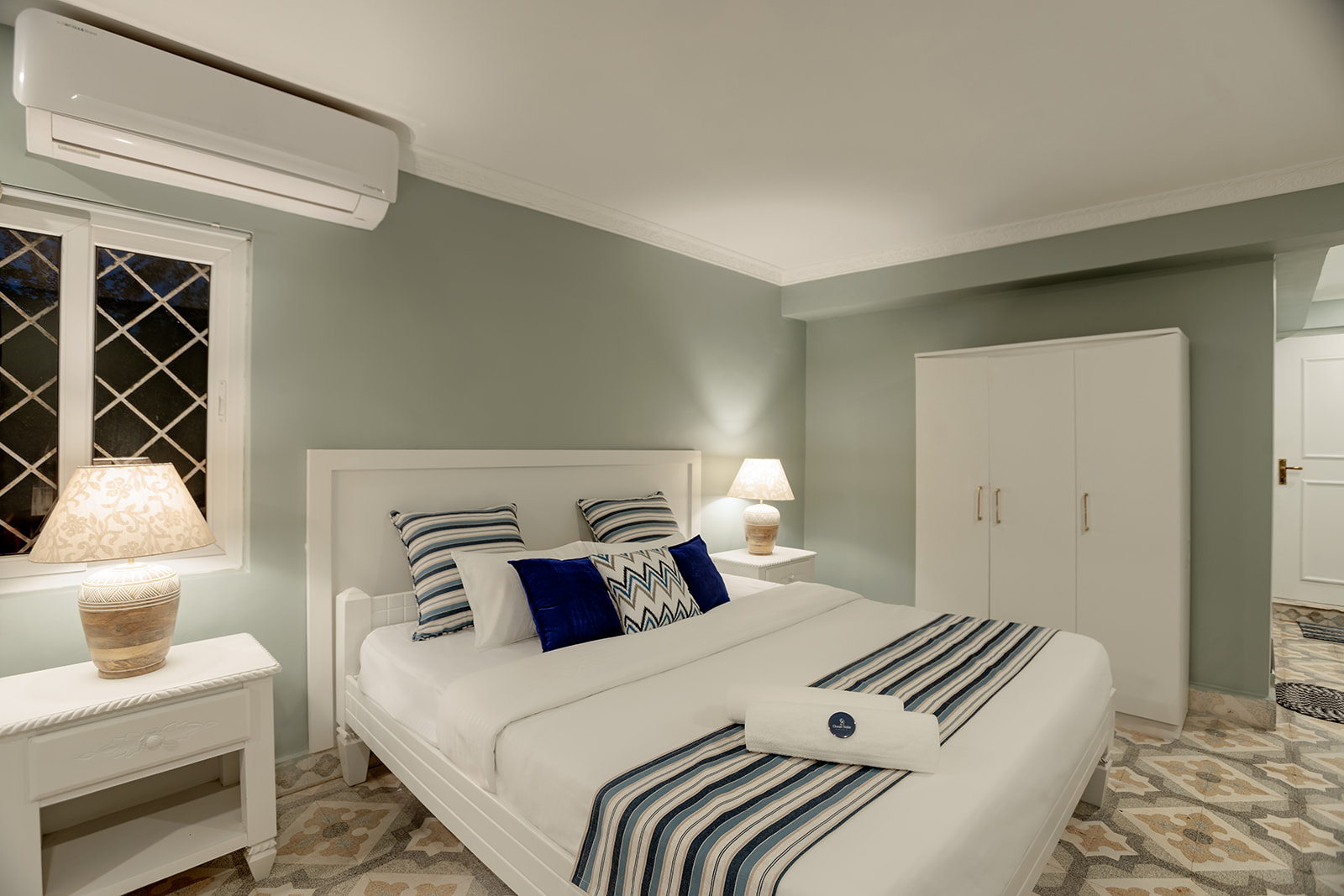 Bedroom interior in the Grand Sea View Room