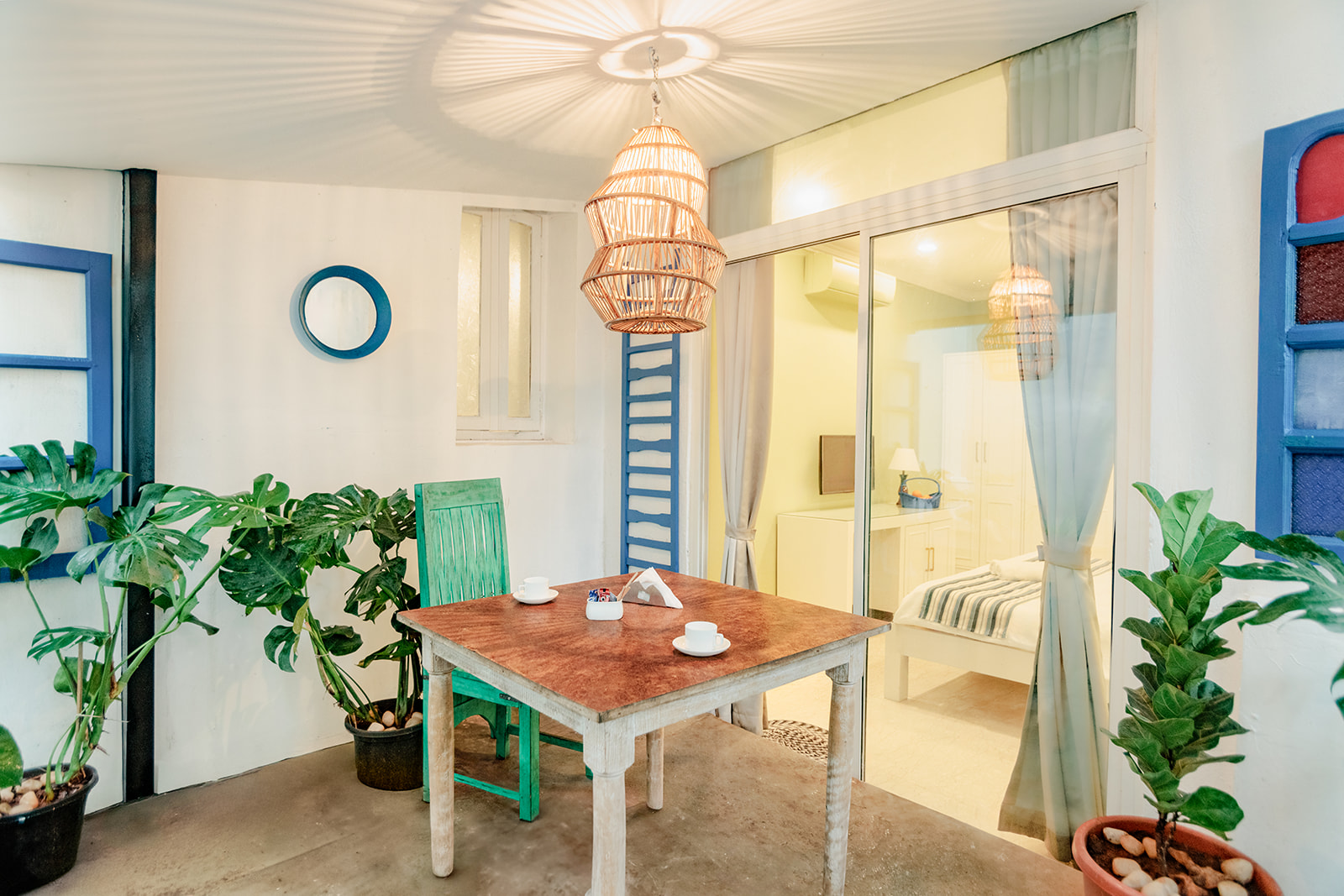 Garden dining sit-out beside the Spacious Double Deluxe Bedroom